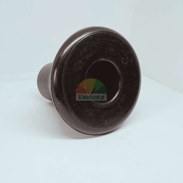 Black rubber bushing, cap, or stopper with a wide flange and a central hole.