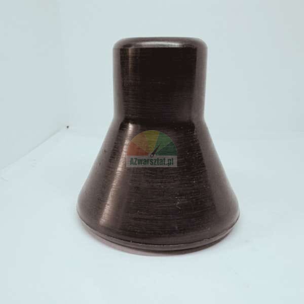 Dark brown or black hourglass-shaped technical component, flared at the base, showing a visible textured surface, against a light background.