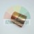 Copper or bronze cylindrical bushing/sleeve on a white background, used as a machine element or plain bearing.
