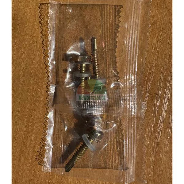 Set of self-drilling screws and washers (metal and rubber) sealed in a small, clear plastic bag, lying on a wooden surface.