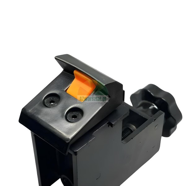 Close-up of a black mounting clamp or bracket featuring an orange quick release button and a black adjustment knob