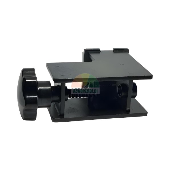 Black metal mounting clamp with an adjustable screw mechanism and a large star knob, isolated on a white background.