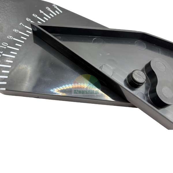 Close-up of a black plastic measuring tool or angle guide with a white numerical scale and a pivot mechanism (screw).