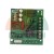 Green printed circuit board (PCB) with capacitors, two relays, and a screw terminal block, control module.