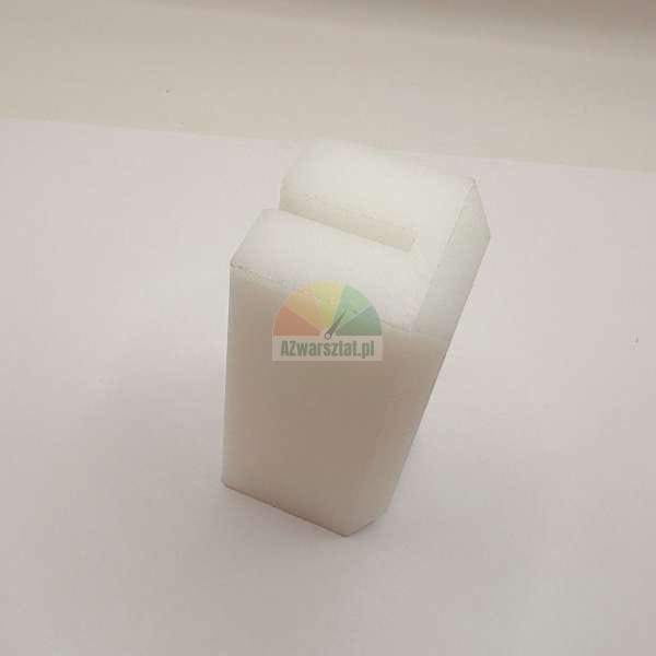 White foam block with a vertical slot on top used for packaging protection
