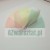 White rectangular plastic block on a light background.