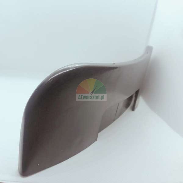 Brown curved plastic component, possibly a mudguard or protective cover.