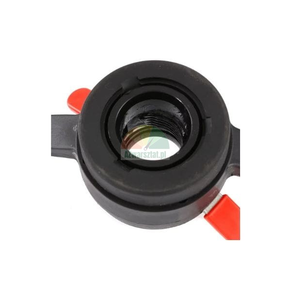 Close-up of a black quick release wing nut with red handles for a wheel balancer