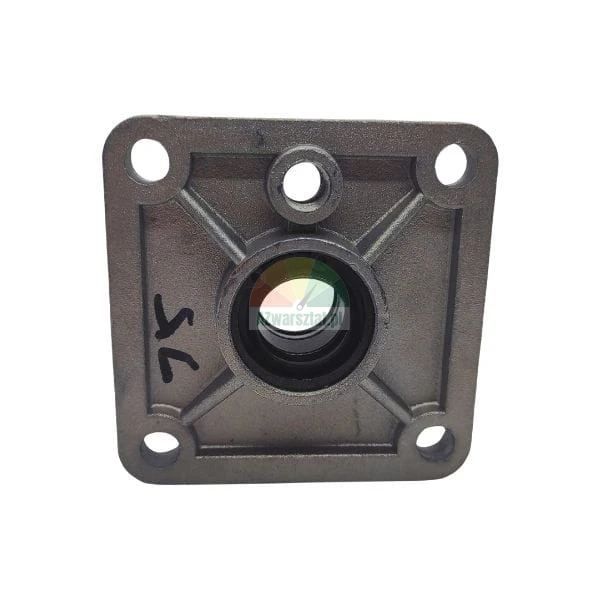 Square metal flange casting with a central bearing and four mounting holes.