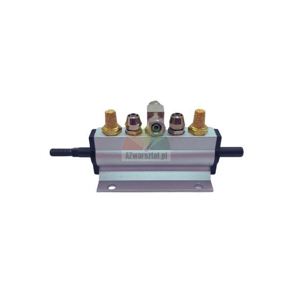 Pneumatic manifold with brass silencers and metallic fittings on a white background