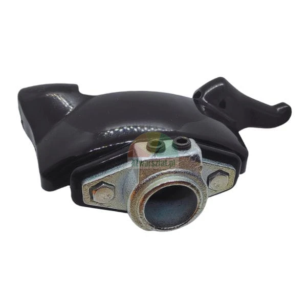 Black cover with a metal mounting flange and bolts, spare part for a tire changer machine.