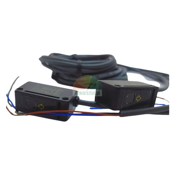 Pair of industrial photoelectric sensors with colored wires and a long black cable bundle.