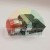 Red industrial push button switch with chrome collar and contact block assembly