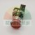 Red industrial push button switch with metal mounting ring and contact block on a light background.