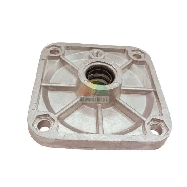 Aluminum housing flange with a central bore and four mounting holes at the corners.