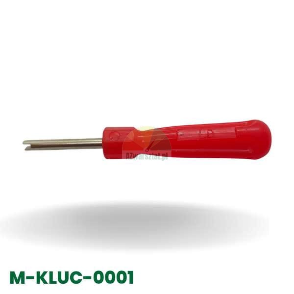 Valve core removal tool with a red handle, designed for tire valve maintenance.