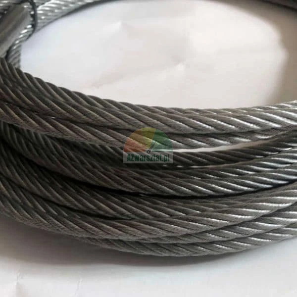 Close-up of galvanized steel wire rope strands coiled in loops.