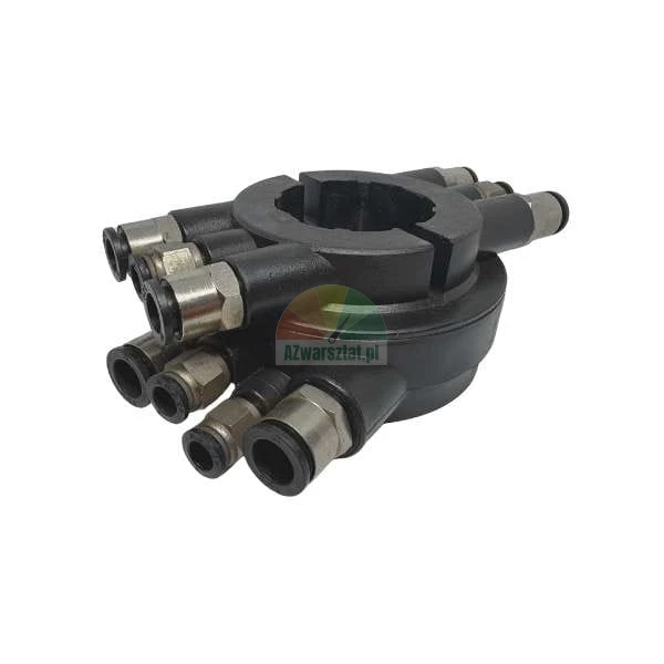 Black pneumatic manifold with multiple push-in fittings on a white background.
