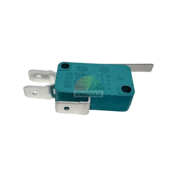 Green microswitch with metal lever and terminals, technical specifications printed on the housing.
