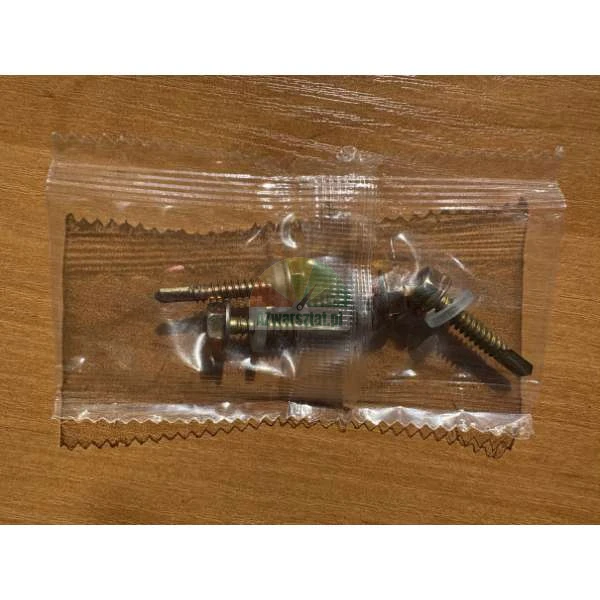 Three self-drilling screws with washers in a transparent plastic bag on a wooden surface.