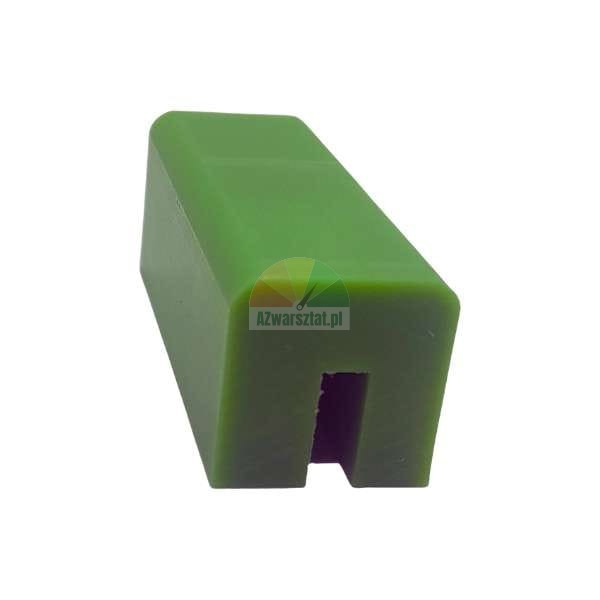Green plastic sliding element with a U-shaped slot