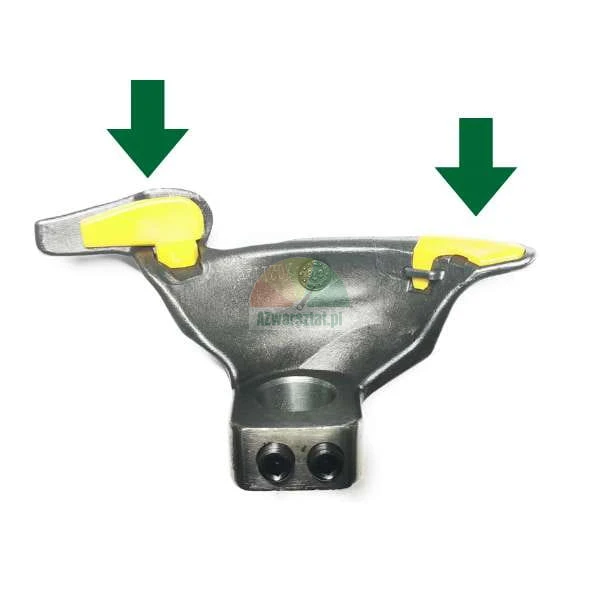 Metal tire changer mount head with yellow protection inserts pointed out by green arrows.