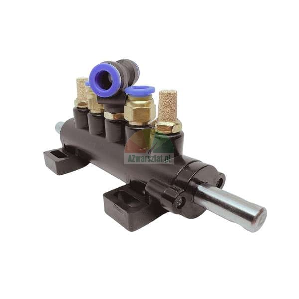 Black pneumatic valve manifold with blue push-to-connect fittings and brass silencers on a white background.