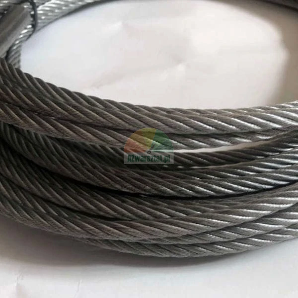 Close-up of coiled steel wire rope on a light background