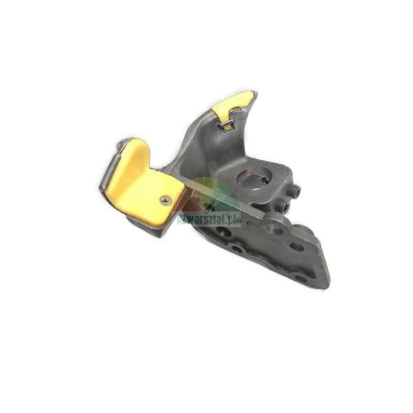 Tire changer mounting head with yellow protective plastic inserts.