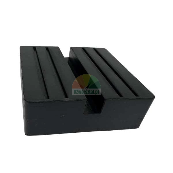 Black rubber jack pad block with a central slot and surface grooves for car lifts.