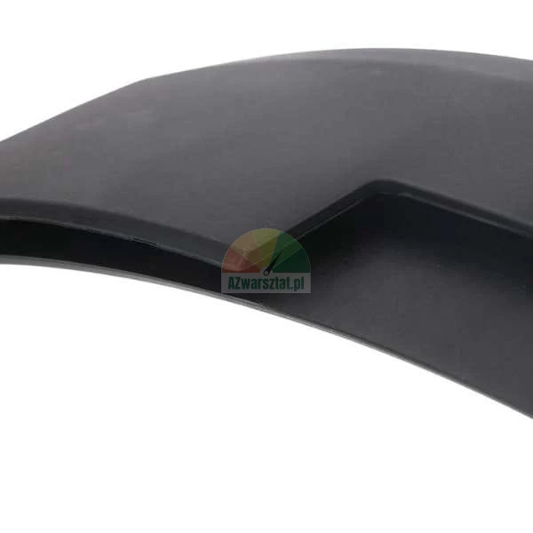 Close-up of the edge of a black matte plastic car body element showing its curved shape.