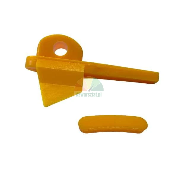 Yellow plastic mounting wedge with a hole and a small curved element on a white background.