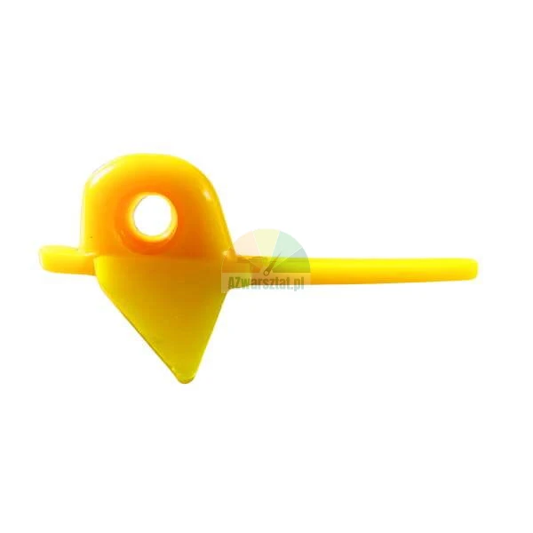 Yellow plastic fixing element with a circular hole and a flat handle on a white background