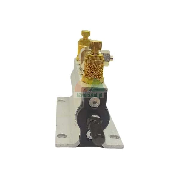 Pneumatic valve block with brass adjusters on an aluminum mounting base.