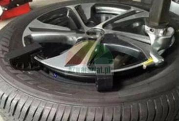 Car wheel on a tire changer machine in a professional service.