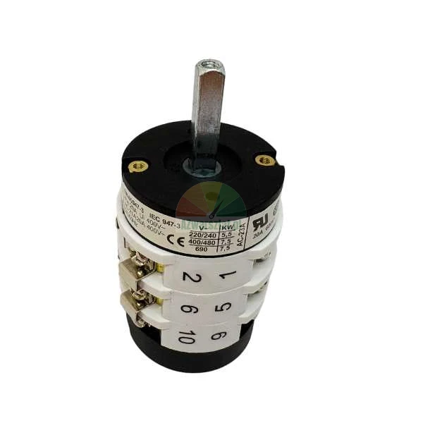 Industrial rotary cam switch with a metal shaft and terminal markings, visible nameplate with technical specifications.