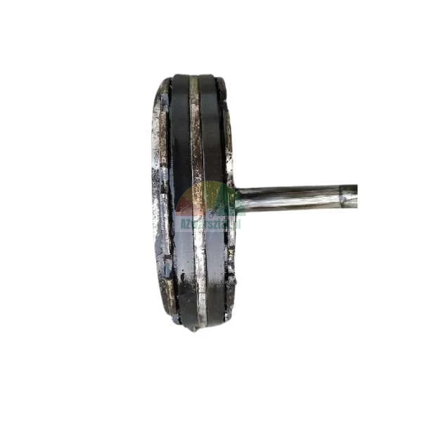 Metal grinding wheel on a shaft, industrial machine part.