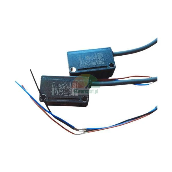 Two industrial proximity sensors by Autonics with connecting wires and certification labels.