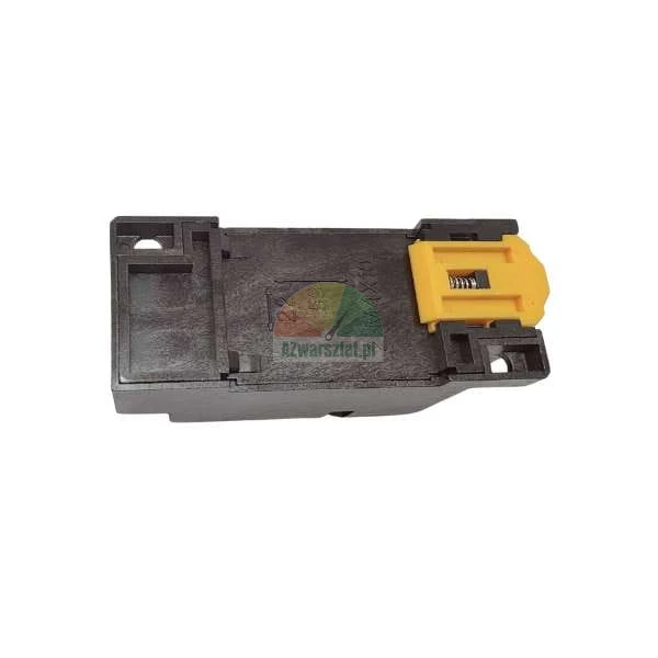 Black plastic mounting base with a yellow latch mechanism and technical markings.