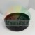 Black circular rubber or plastic protective cap with two visible holes inside.