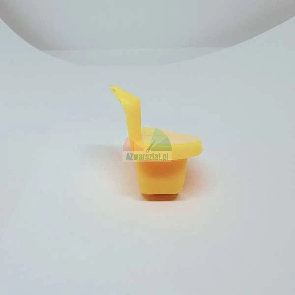 Small yellow plastic dollhouse seat on a white background.