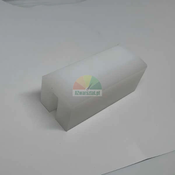 White plastic sliding element or guide with a notch on a white background.