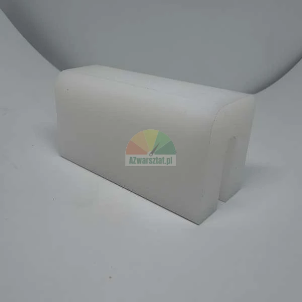 White U-shaped plastic edge protector on a gray background