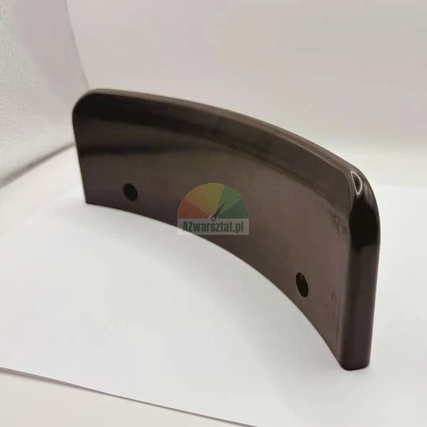 Curved dark brown ceramic element with two mounting holes.