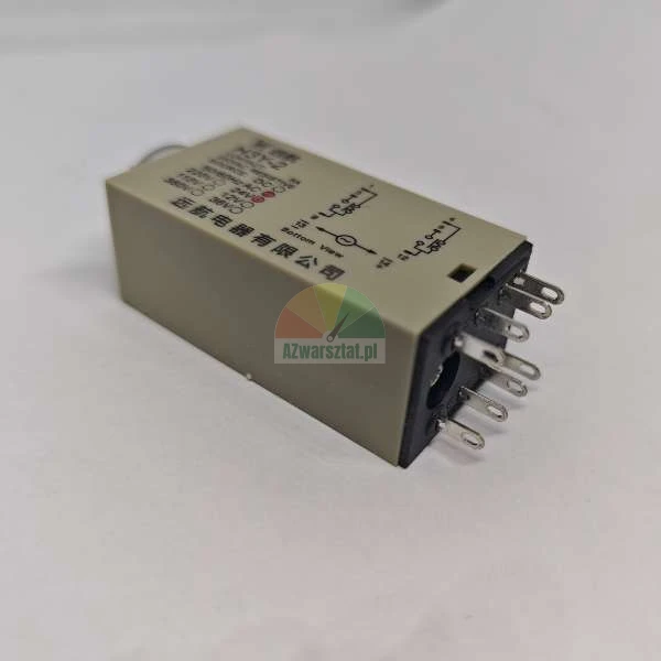 Industrial electromagnetic relay with schematic diagram and metal pins, beige housing.