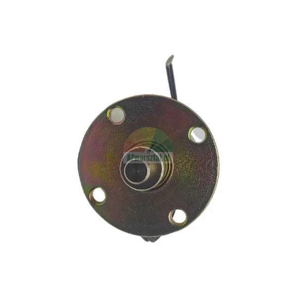 Metal fuel shut-off solenoid with a circular flange and four mounting holes, top view.