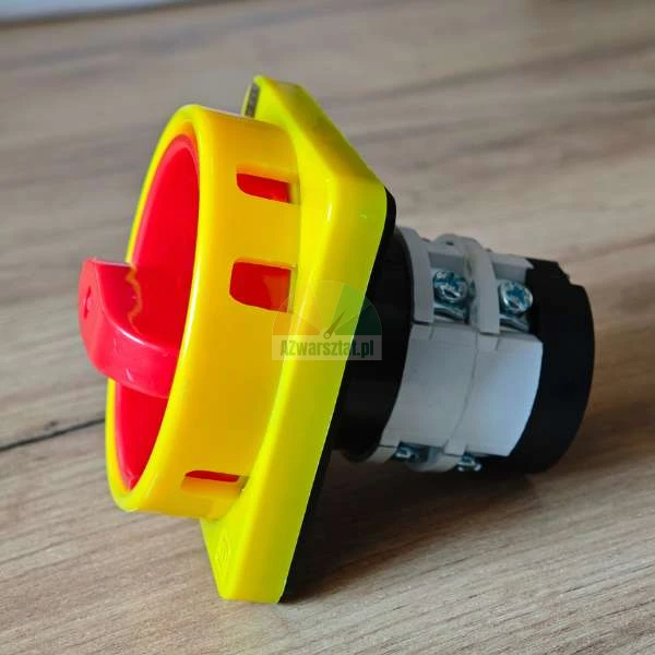 Industrial emergency stop rotary switch with red handle and yellow housing