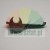 Black plastic spare part, likely a latch or lever for a household appliance, on a light background.