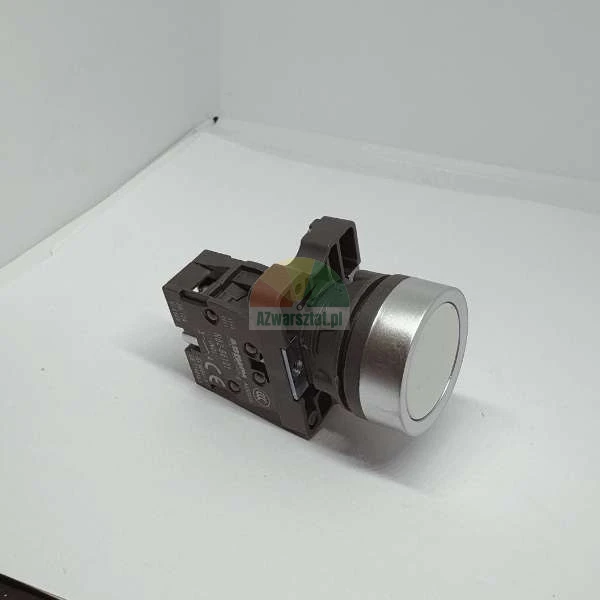 Industrial push button switch with white actuator and silver bezel on a dark housing.