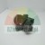 Industrial electrical contact block with 3 NO 4 terminals on a white background.